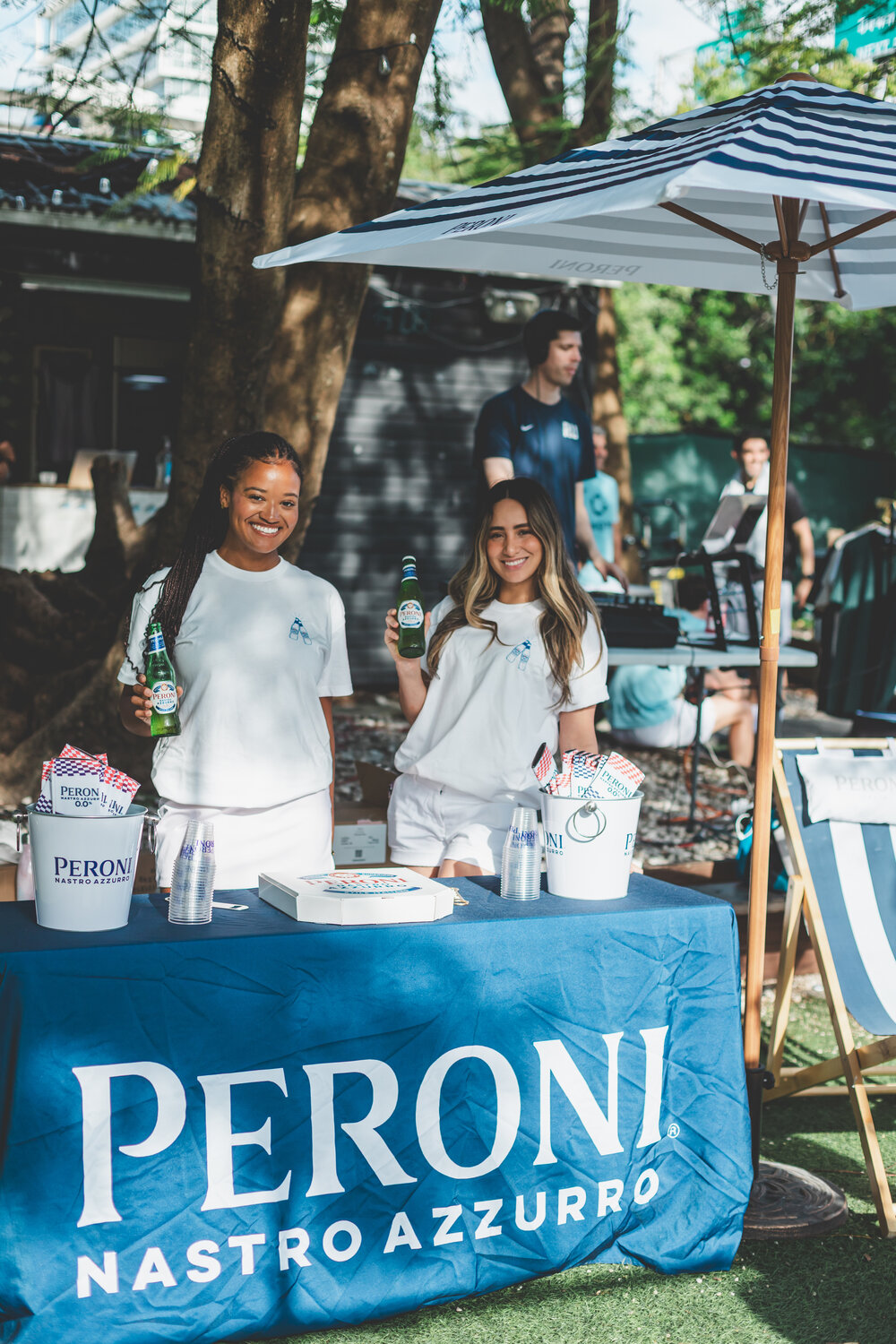 Peroni brand activation booth at a CFL event